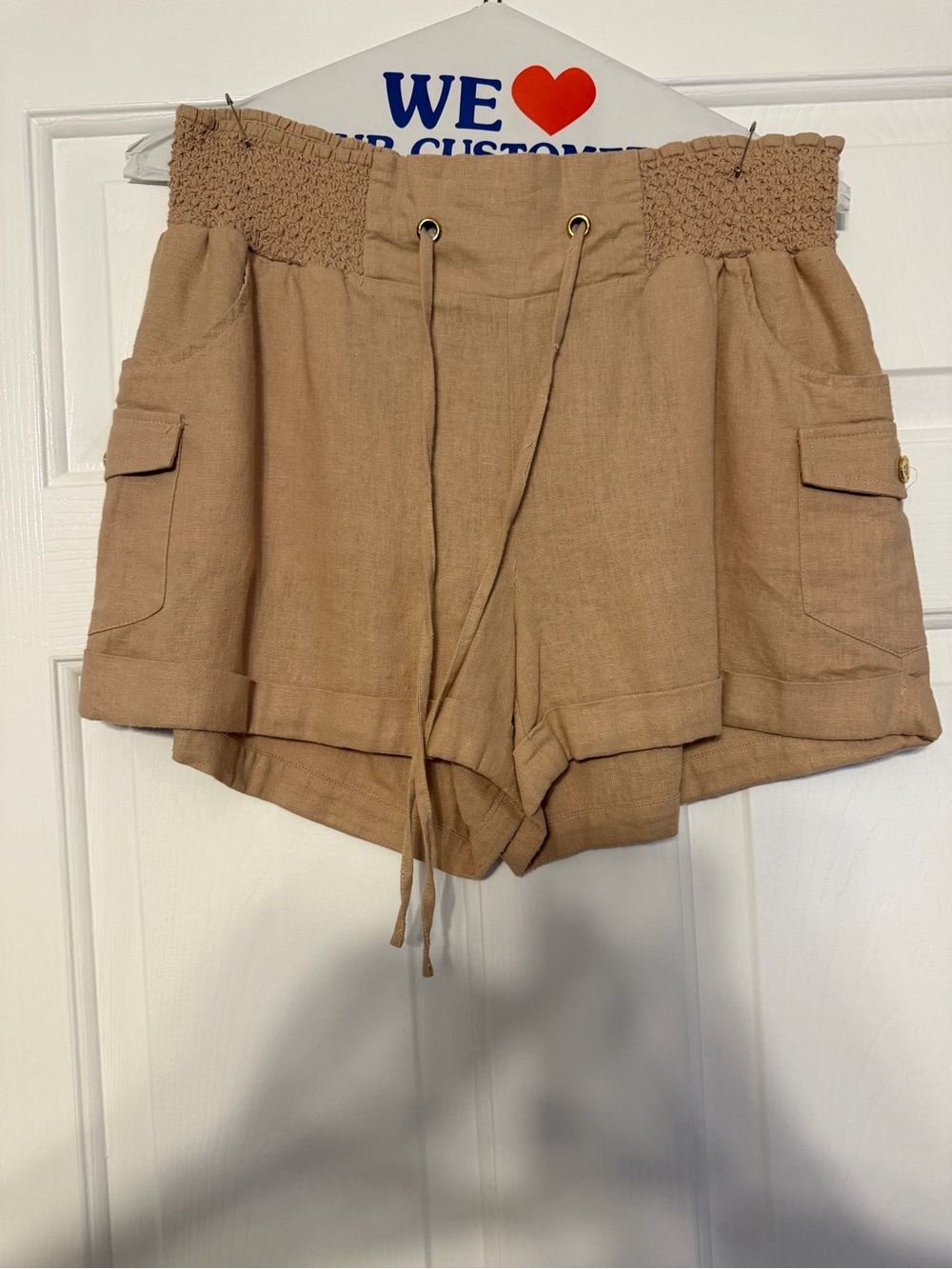 bebe Smocked Waist Cargo Shorts in Tan/Camel